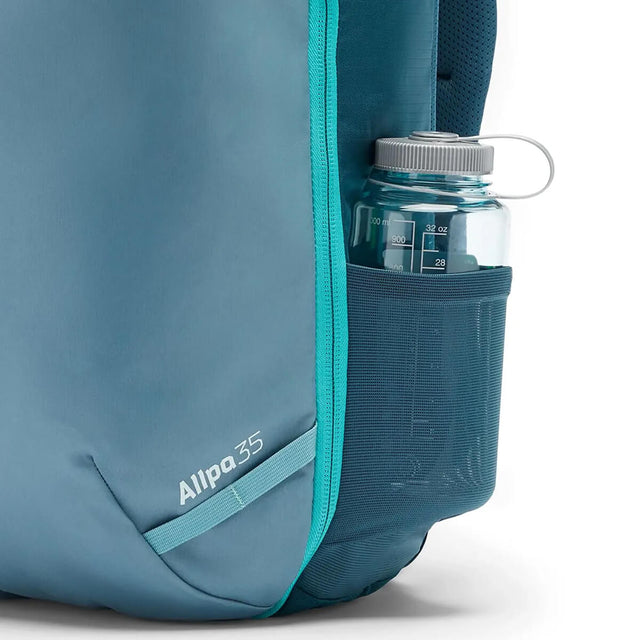 Blue Spruce/Abyss bottle in side stretch pocket