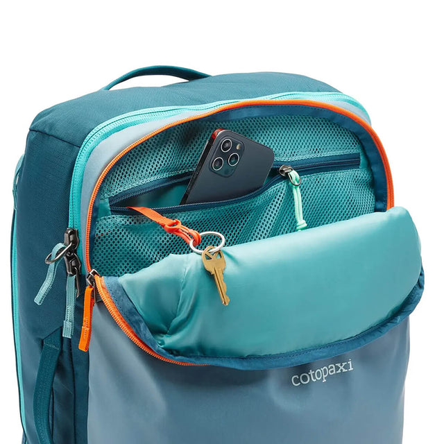 Blue Spruce/Abyss interior of organisation pocket shown in use