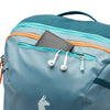 Blue Spruce/Abyss top stash pocket in use