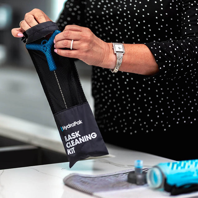 Putting the brush into its pouch