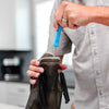 Using the bristle brush to clean a reservoir