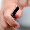 Detail of tube brush being used on the end of a drinking tube