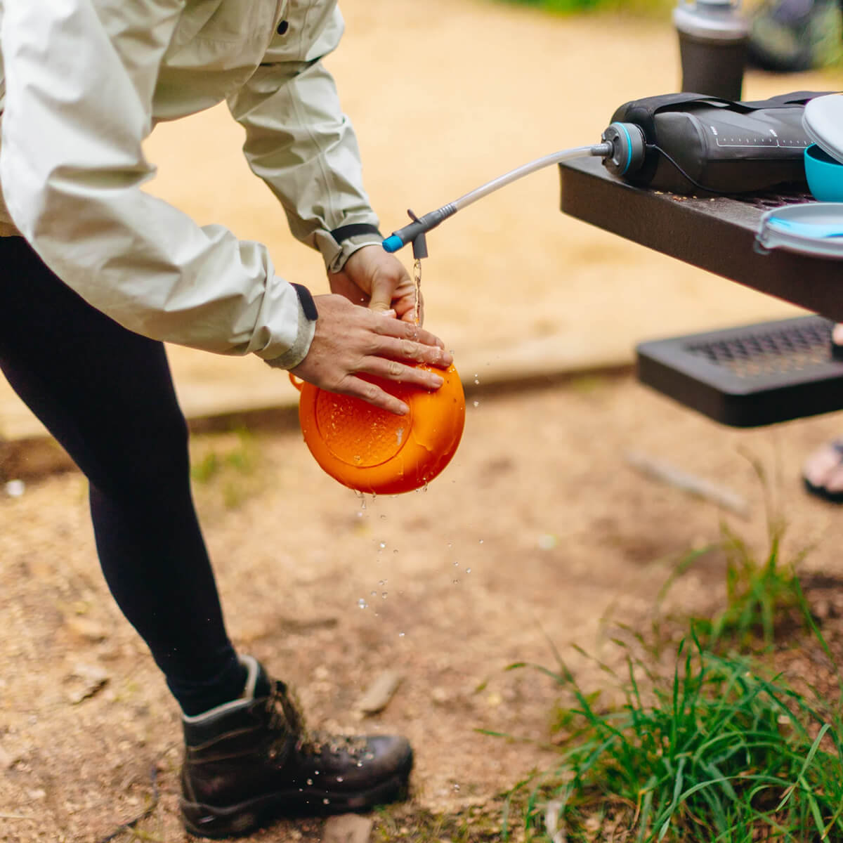 With Camp Tap attached and in use rinsing a bowl