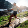 350ml version held by runner on a track with puddles