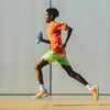 Blue, held by runner in urban environment