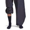 Midnight Navy/Dk Loden on model, front view, one trouser leg up, one down