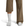 Blizzard Heather on model, front view, one trouser leg up, one down