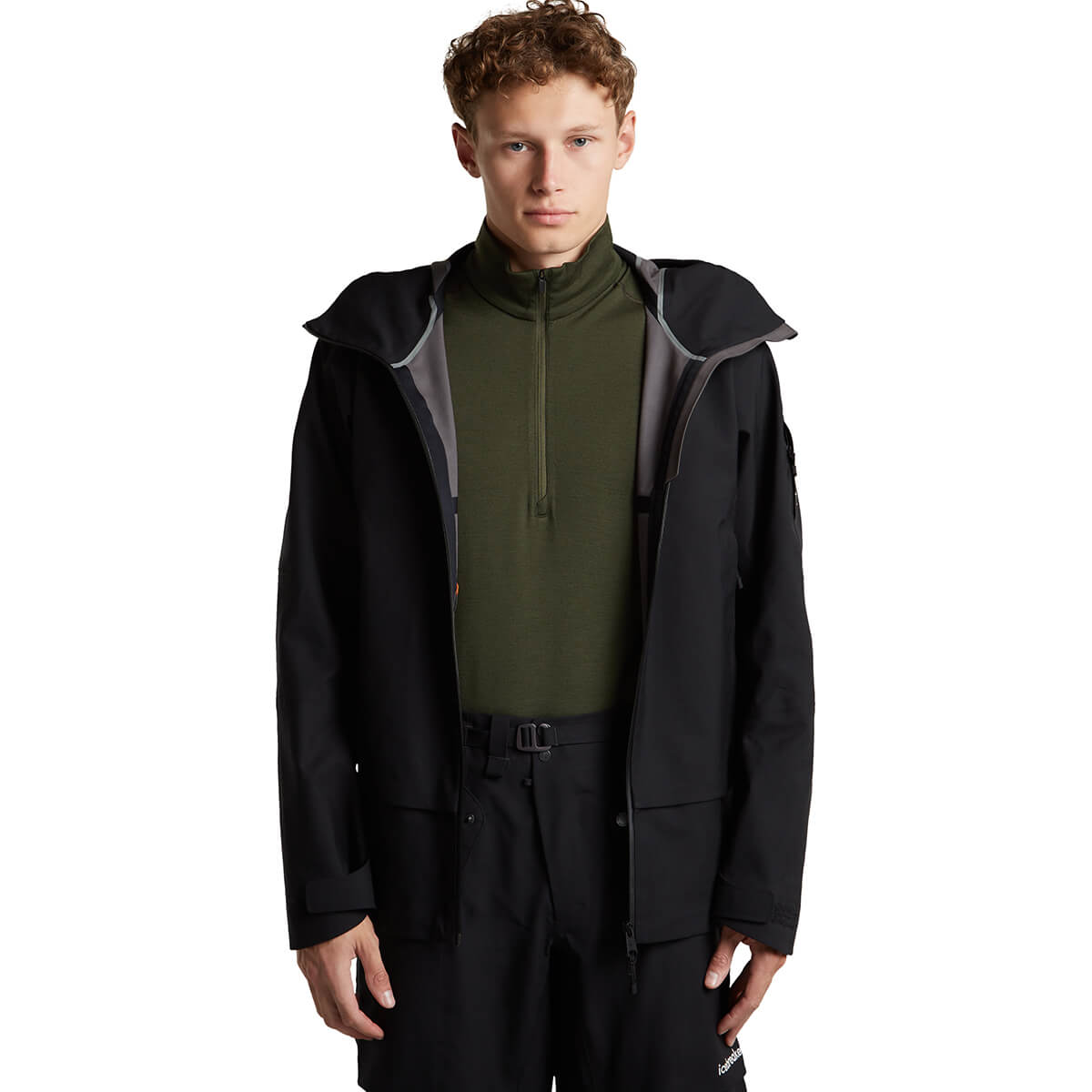 Worn under open rain jacket