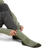 Lichen/Dk Loden being put on by model