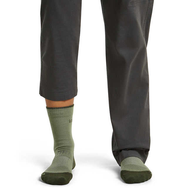 Lichen/Dk Loden on model, front view, one trouser leg up, one down