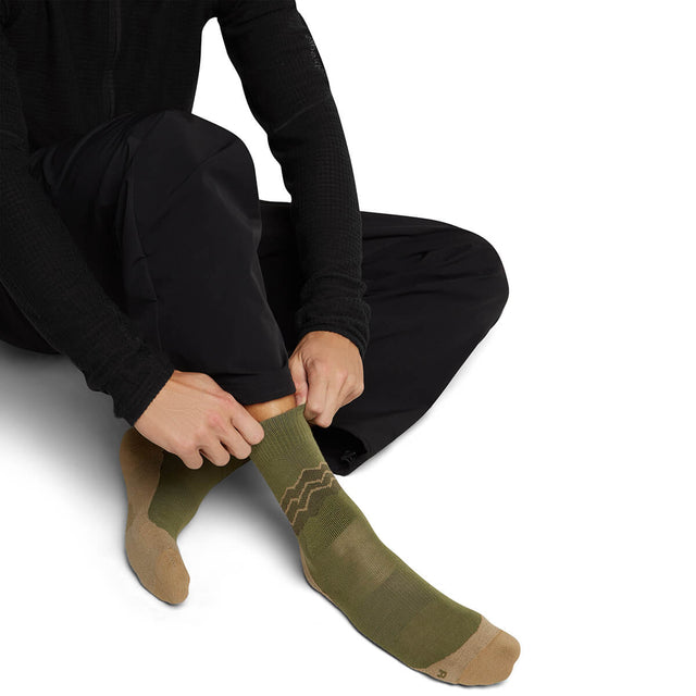 Sphagnum/Cumin/Dk Loden being put on by model