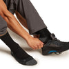Black/Obsidian shoe being pulled on