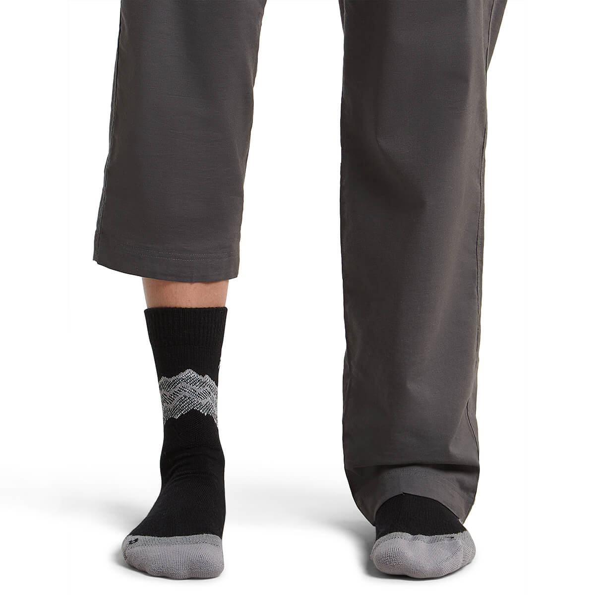 Black/Alloy/Snow on model, front view, one trouser leg up, one down