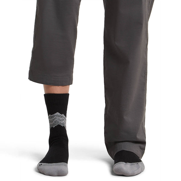 Black/Alloy/Snow on model, front view, one trouser leg up, one down