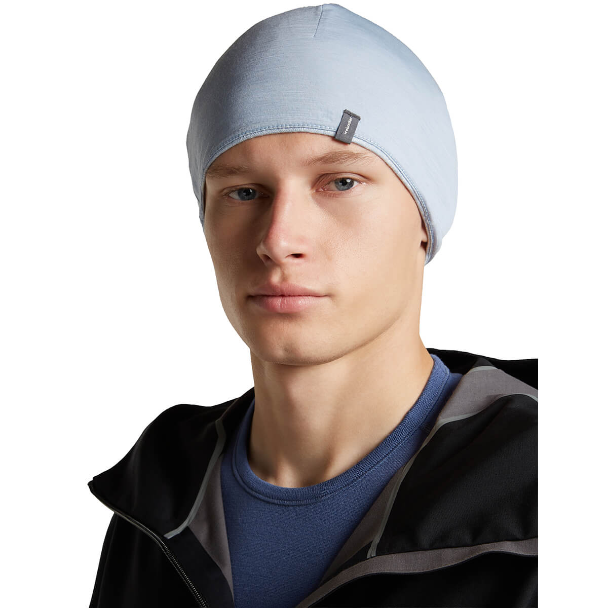 Snow/Zinc Blue reversed, on male model, 3/4 front view