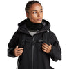 Black/Obsidian reversed, worn with jacket and pack by female model, front view