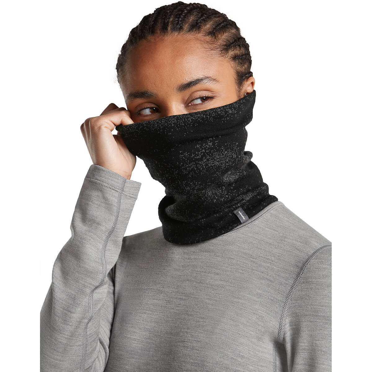 Black/Obsidian, pulled over ears and nose of female model