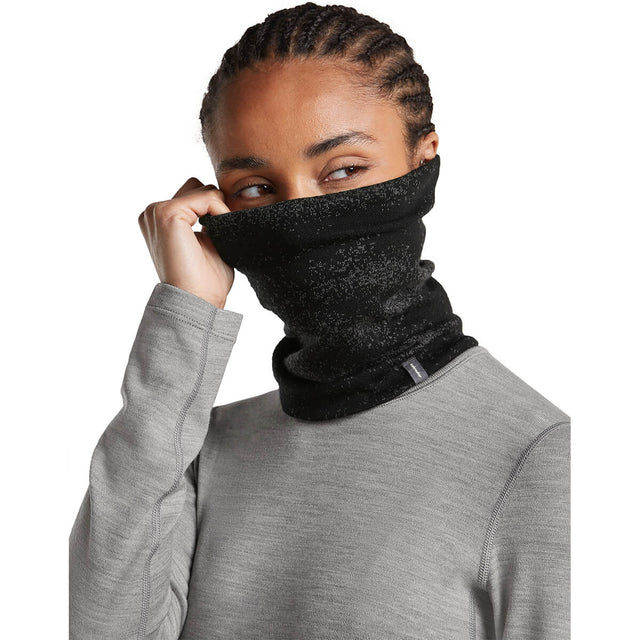 Black/Obsidian, pulled over ears and nose of female model