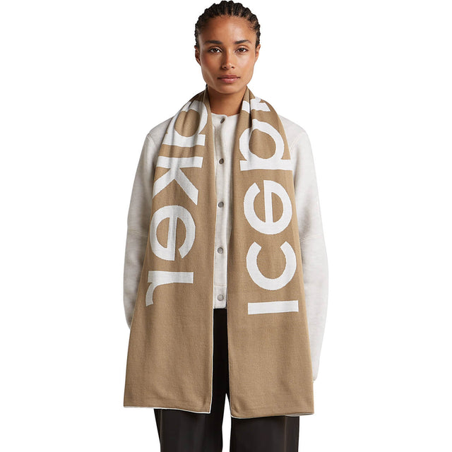 Ecru Heather/Cumin worn by female model, Cumin side out