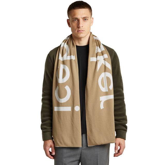 Ecru Heather/Cumin worn by male model, Cumin side out