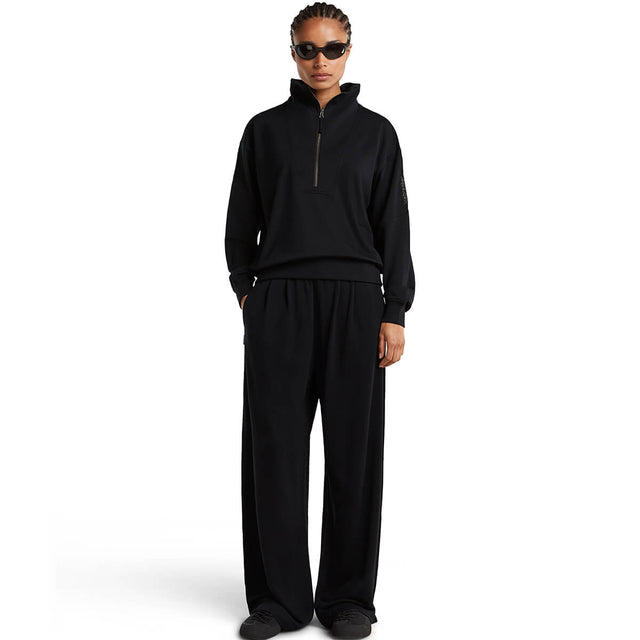 Black, worn with long sleeved top