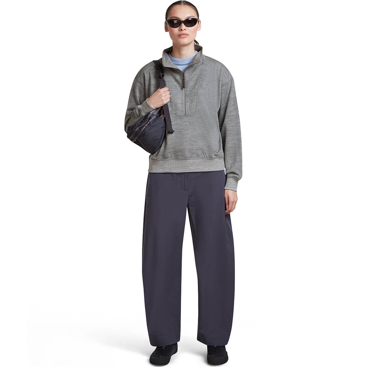 Metro Heather, worn with collar open and bag over one shoulder