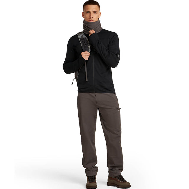 Black, worn closed with chute over neck and pack over one shoulder