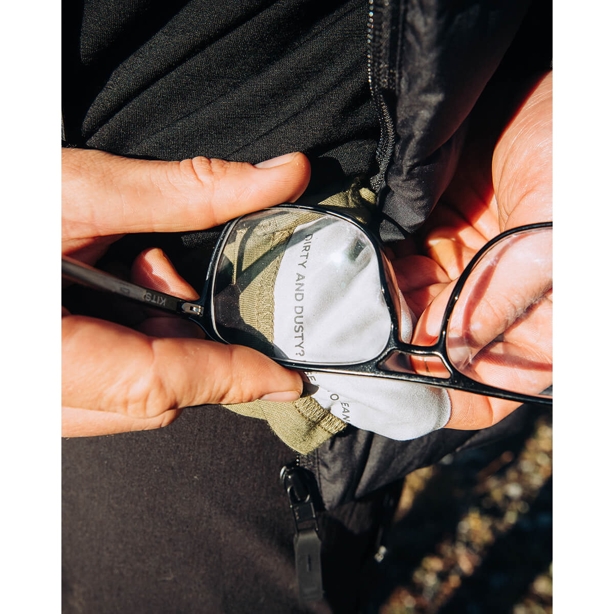 Fern/Olive, glasses wipe in use