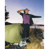 Black, worn in the outdoors outside a tent and bike