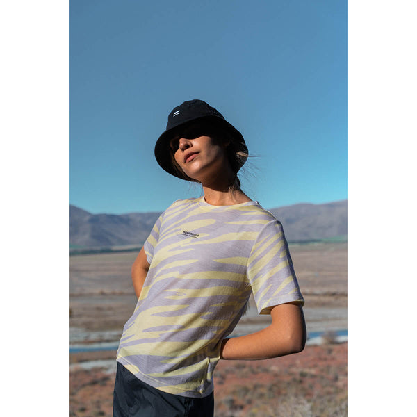 Black worn by female model in the sunny outdoors