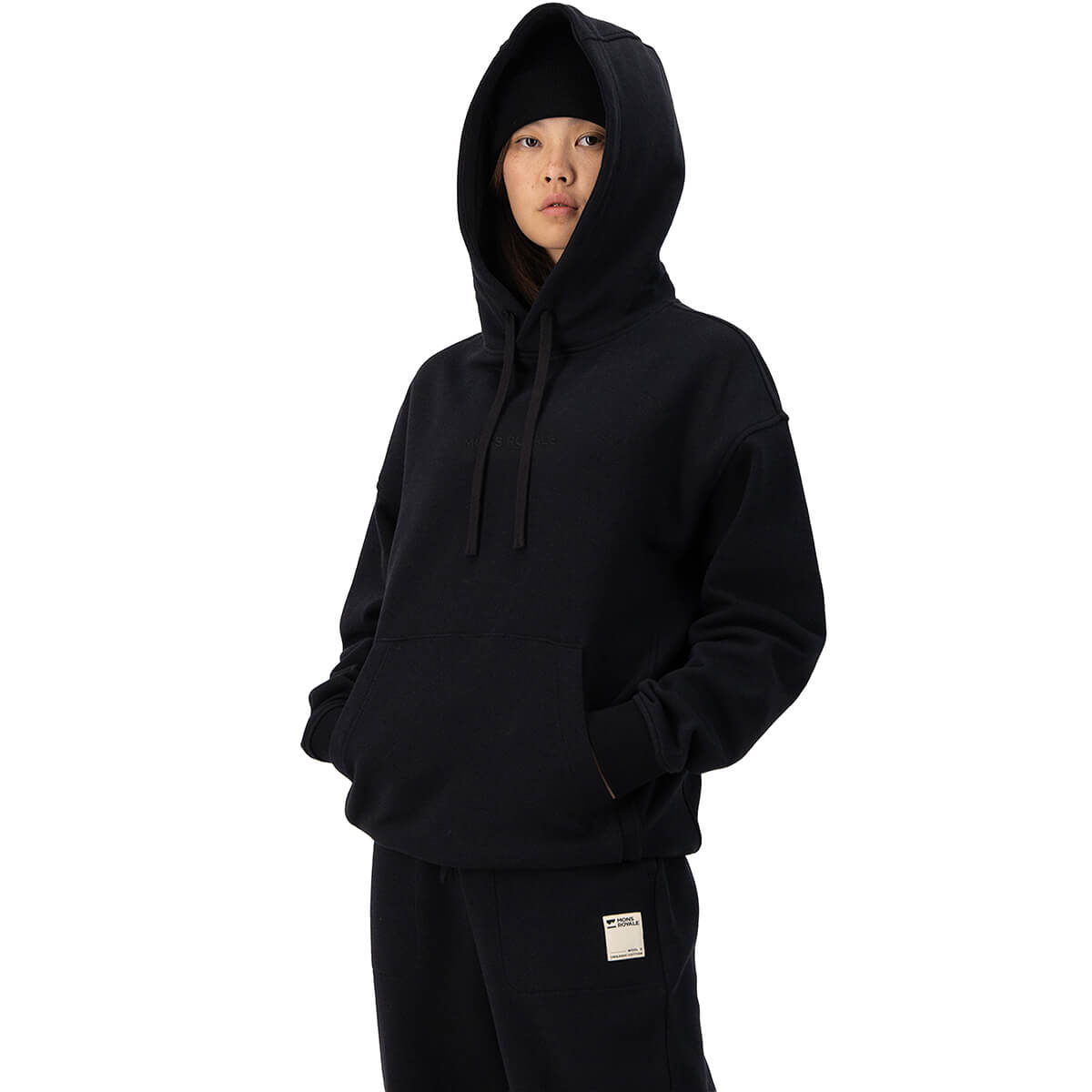 Black worn by female model, 3/4 view, hood up