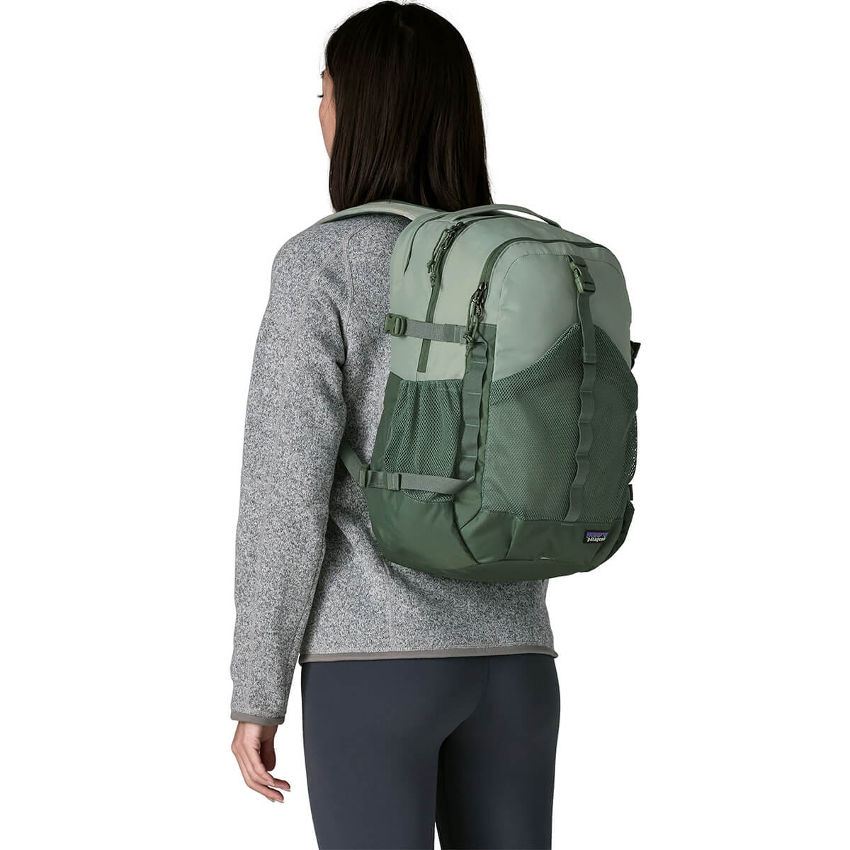 Cover Green carried on back by female model
