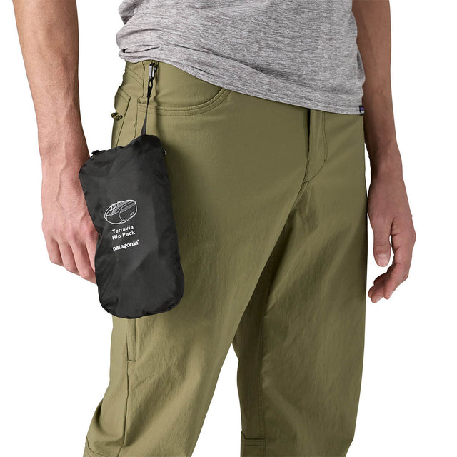 Black, stowed in pocket and carrried from waist