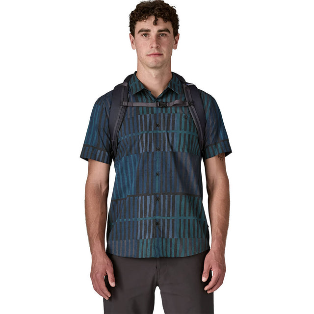 Smolder Blue w/Forge Grey carried by male model showing sternum strap