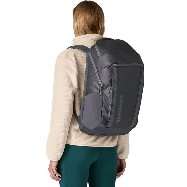 Smolder Blue w/Forge Grey carried on back by female model