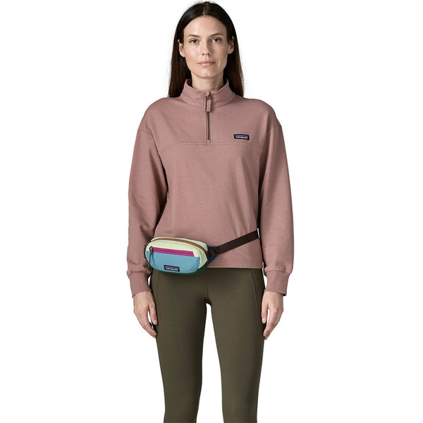 Patchwork/Snowmelt Blue worn at right front as hip pack by female model