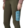 Patchwork/Snowmelt Blue stowed in pocket and carried by loop