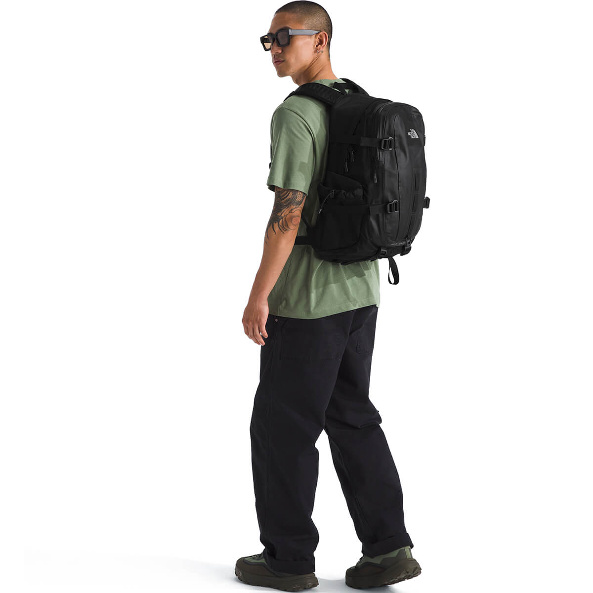 Black, carried on back by male model