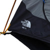 Corner detail of pole inserted into fly and canopy