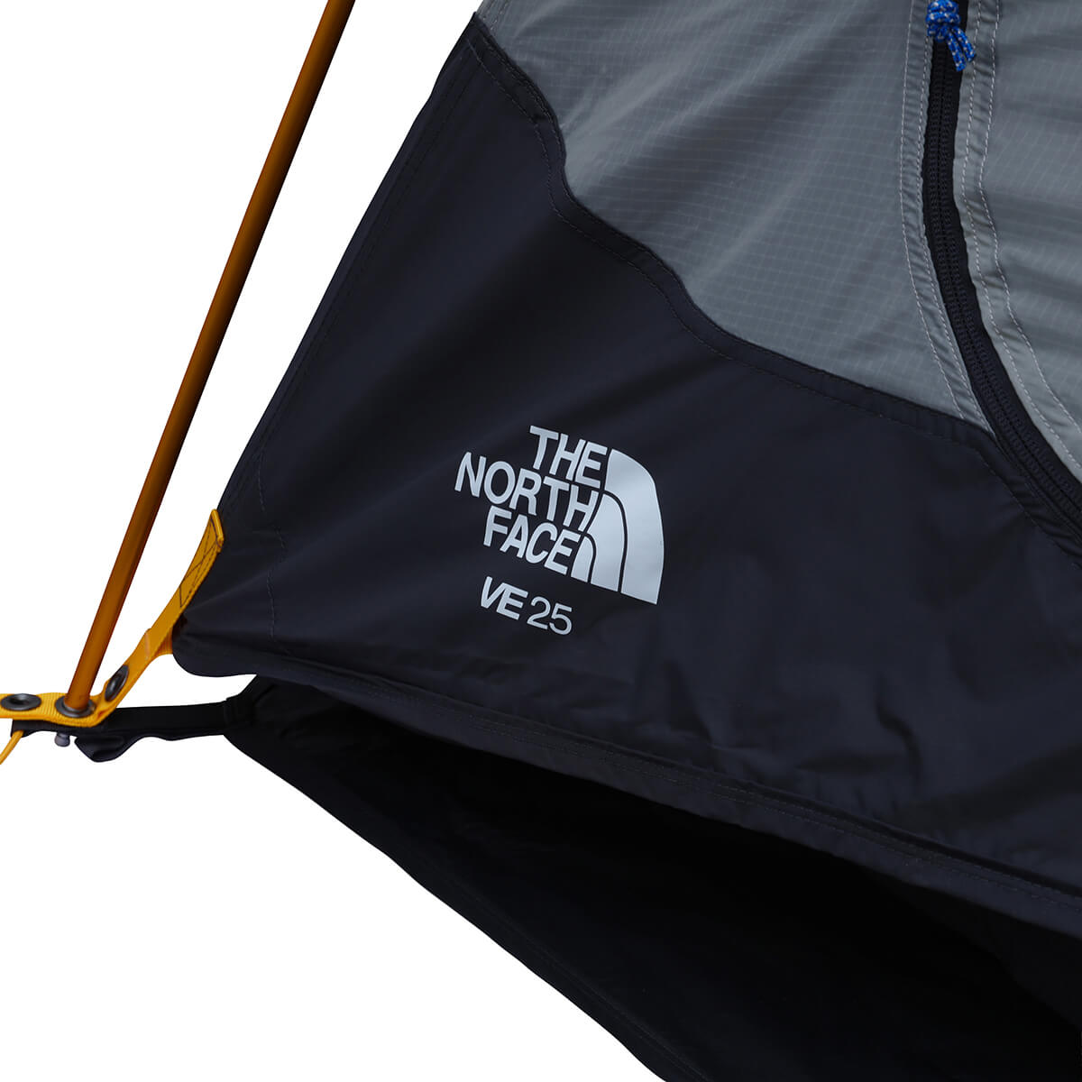 Corner detail of pole inserted into fly and canopy