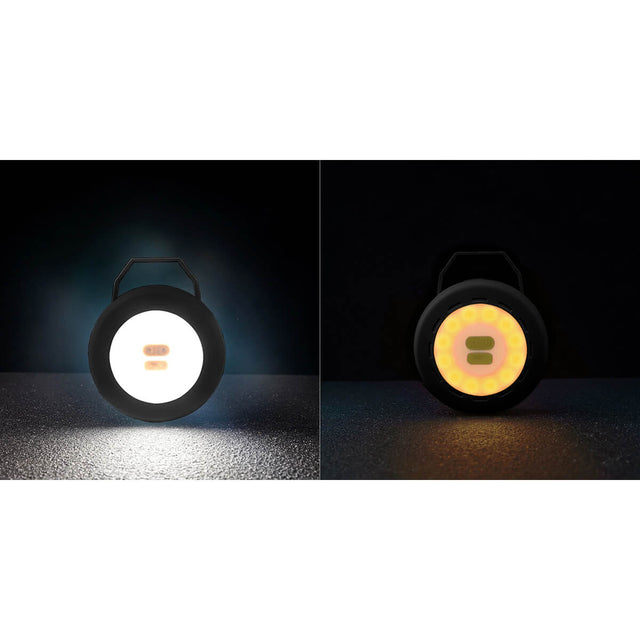 Front on lantern lit with white light beside one lit with amber light