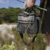 In use, held in same hand as a fishing rod in the outdoors