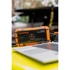 Charging a laptop in the outdoors