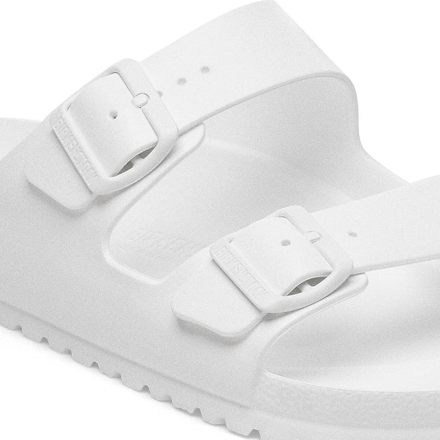 White 3/4 detail of straps and buckles
