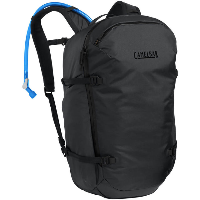 3/4 front view with reservoir drinking tube showing over left shoulder strap