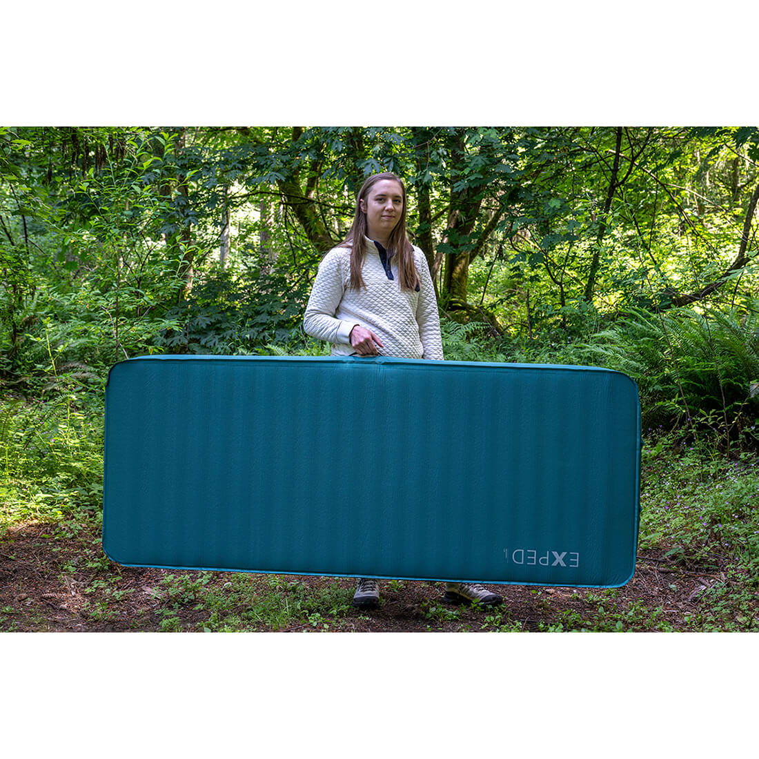 Long Extra Wide being carried by handle