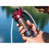 Attaching to bottle with water in the background