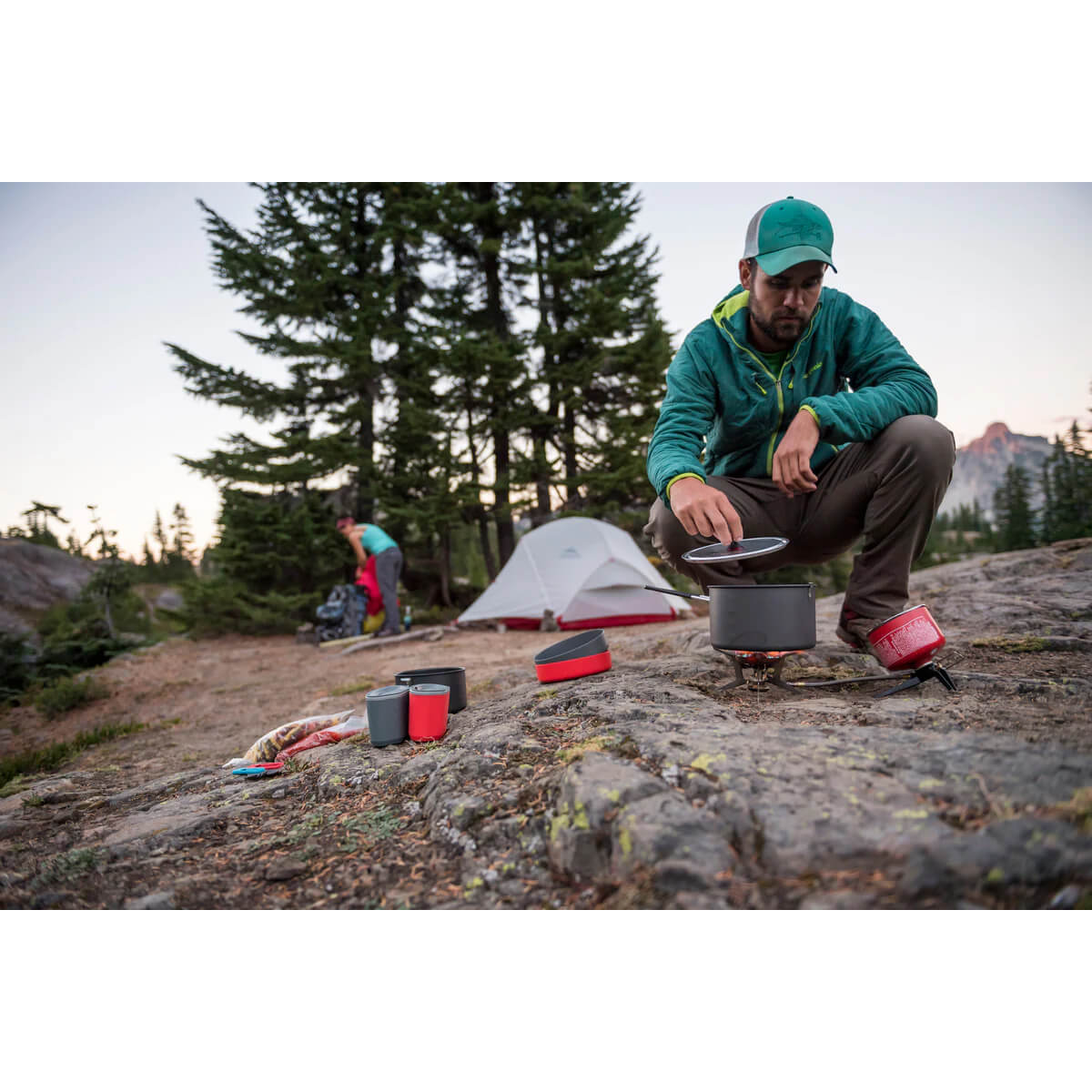Shown in use on a rocky surface at a camp site 