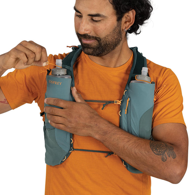 Cascade Blue securing flask in vestpack
