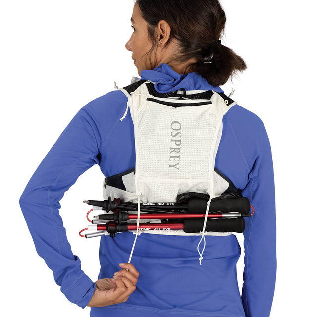 Mystery White attaching poles to the harness horizontally across the back